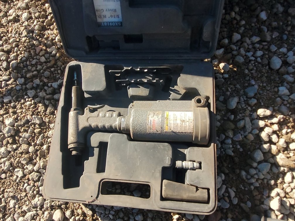 Air rivet gun and clamp.