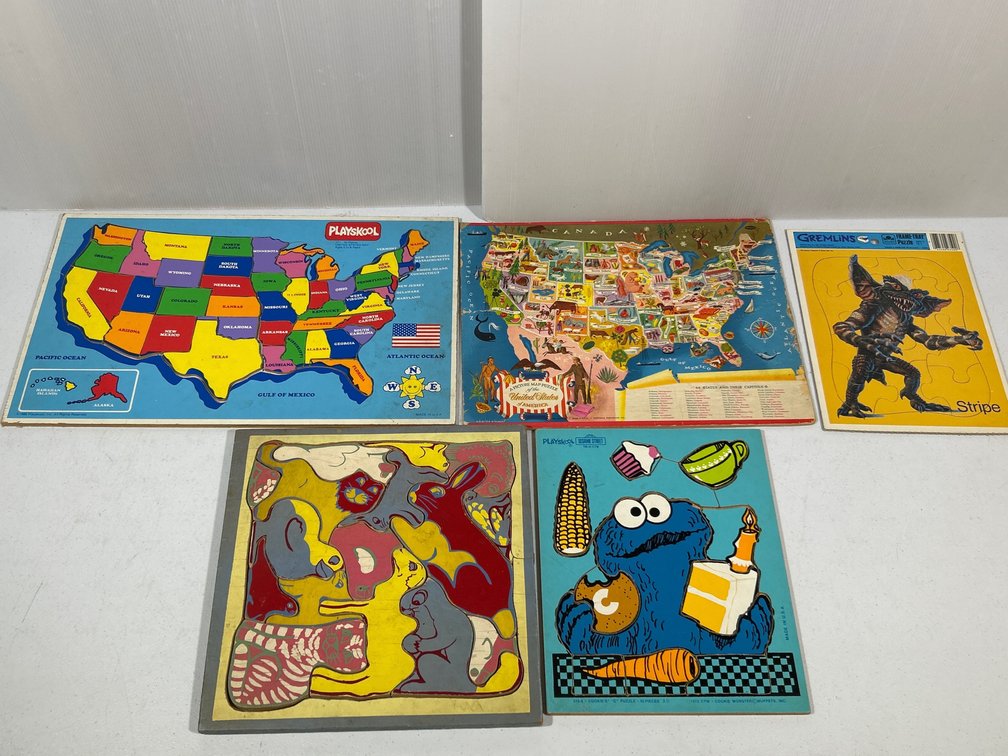 5 Tray Puzzles- 2 are United States, Stripe Character, Bunnies and Cookie Monster