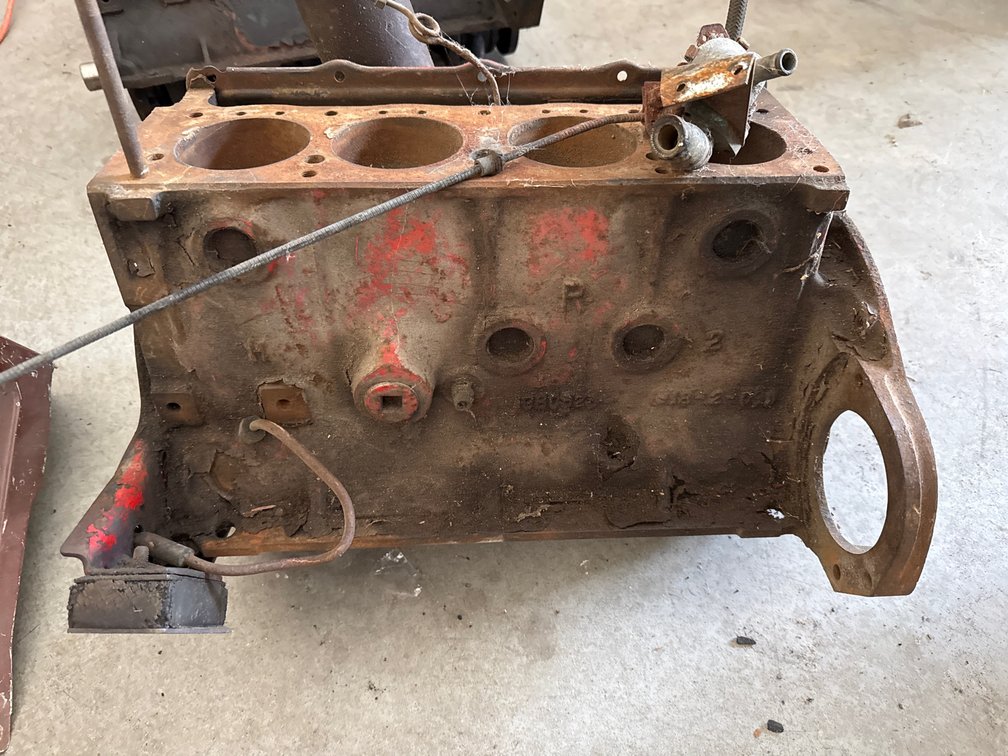Vintage Four-Cylinder Bare Engine Block with Oil Filter Assembly