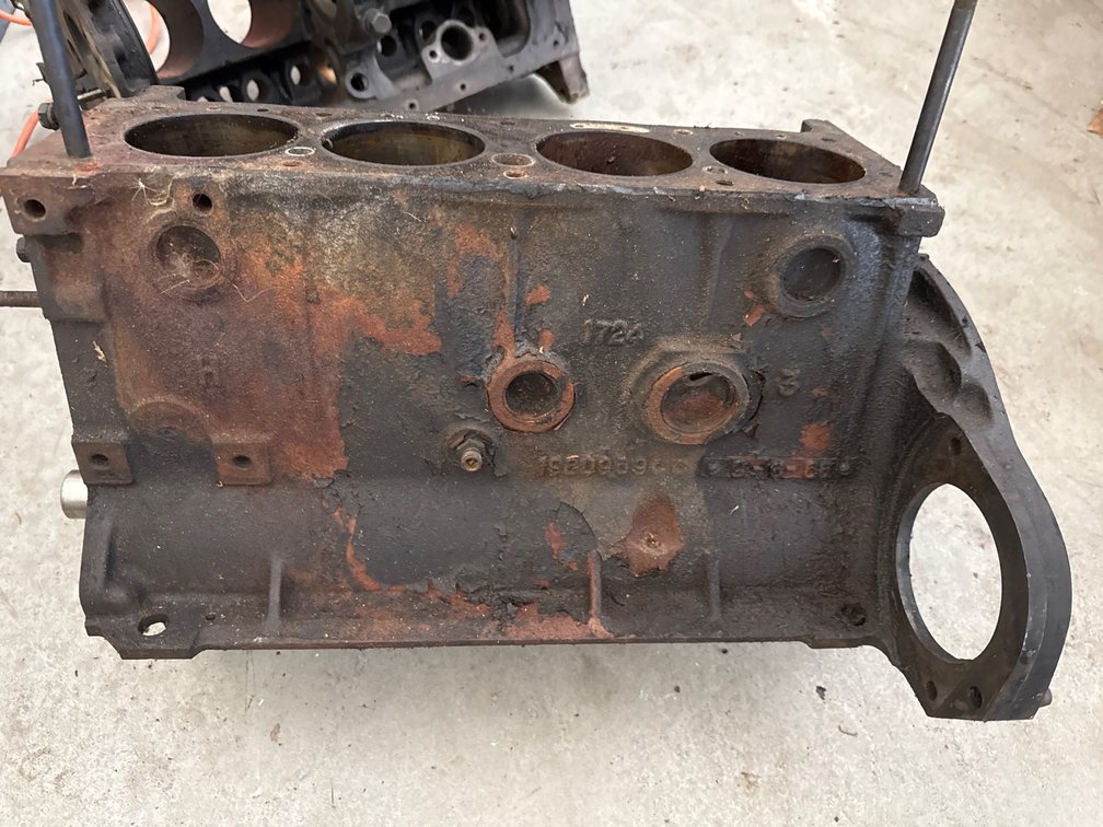 Vintage Four-Cylinder Bare Cast-Iron Engine Block