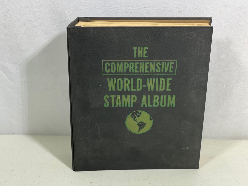 The Comprehensive World-Wide Stamp Album with Stamps Inside