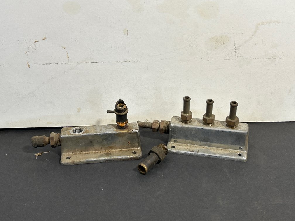 Two Vintage Automobile Engine Fuel Splitters
