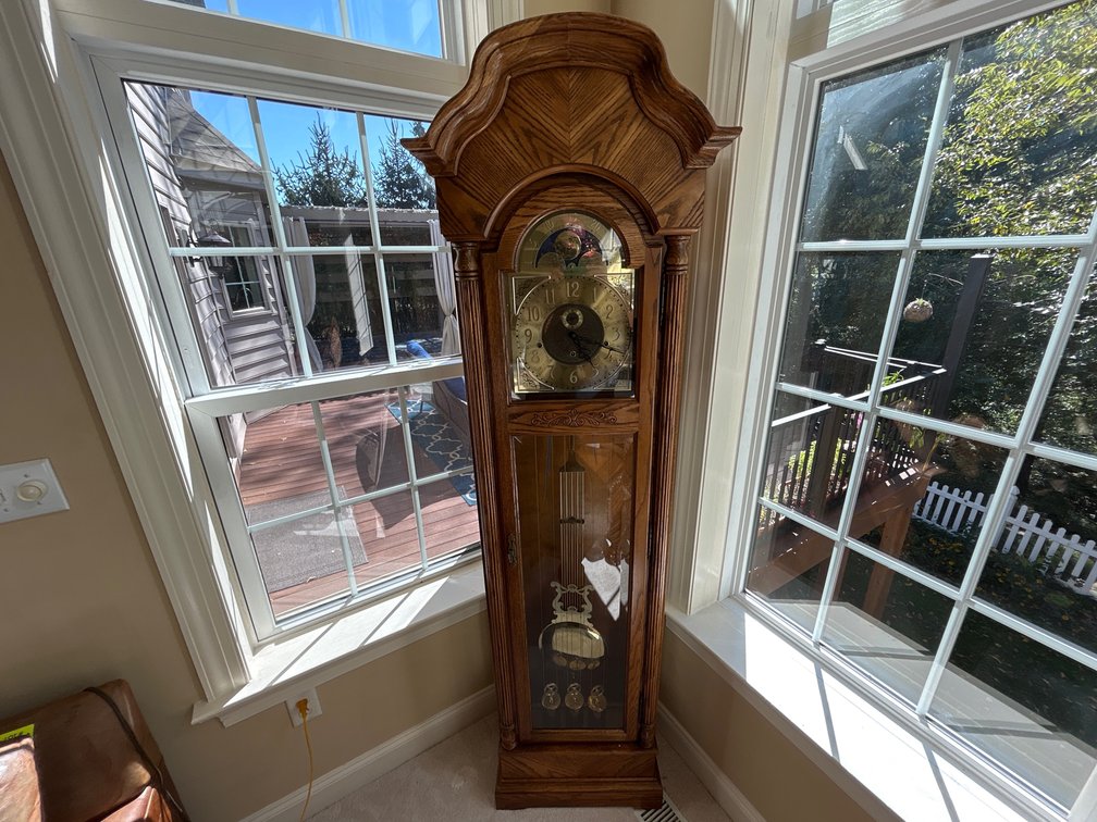 Howard Miller Oak Cased Tall Case Clock with Key