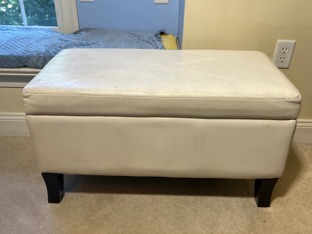 White Vinyl Upholstered Ottoman with Storage Inside