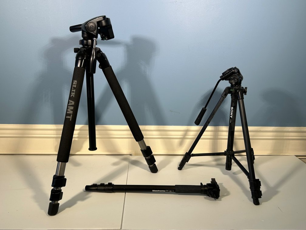 2 Tripods- Manfrotto with Extra Piece and Slik with Carry Bag