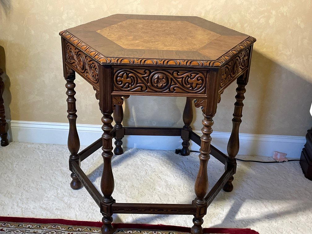 Octagonal Table with Heavy Carving, Top Comprised of Two Woods