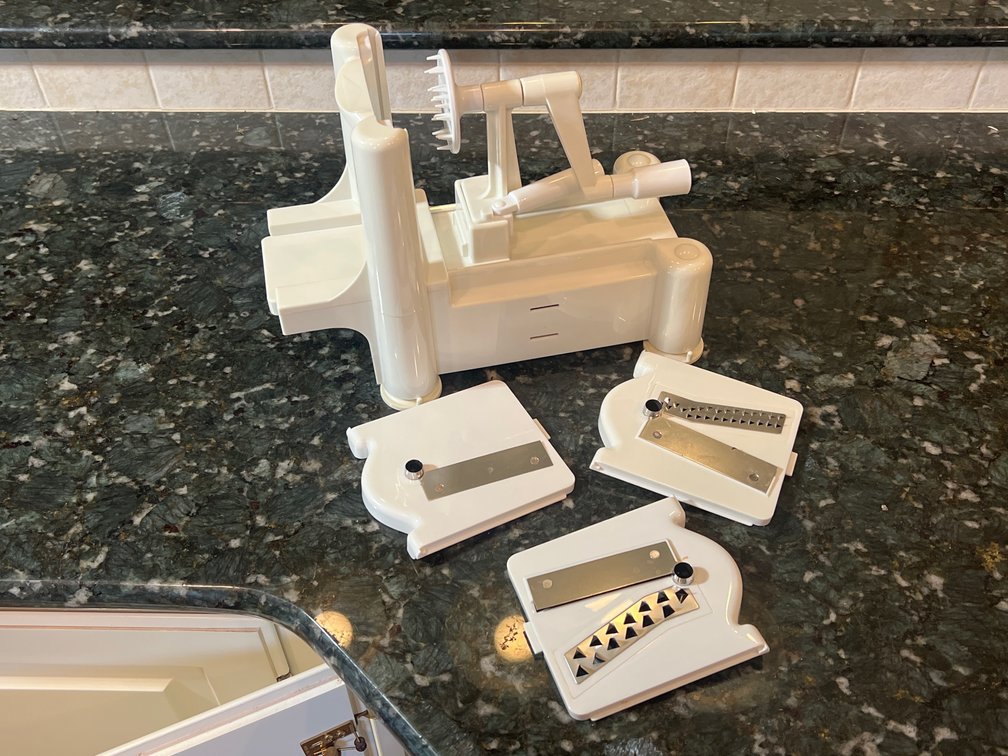 White Plastic Manual Grater with Assorted Blade Attachments