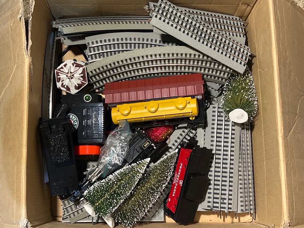 Box of Train Cars, Train Track- Curved & Straight, Brush Trees, Lionel Transformer