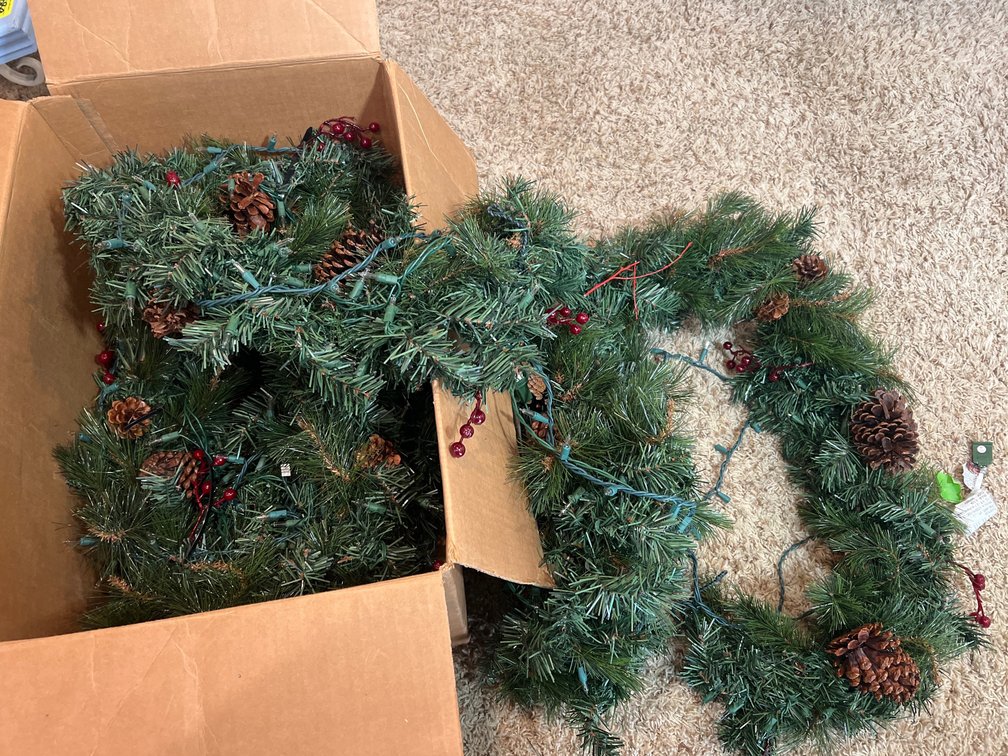 Pre-Lit Artificial Christmas Garland and Wreath decorated with Pinecones and Berries