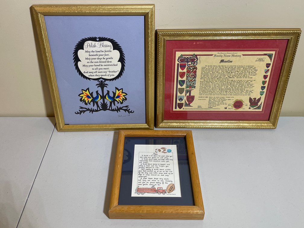 Three Framed Artwork Pieces Including Polish Blessing Scherenschnitte, Family Name History, and Poem