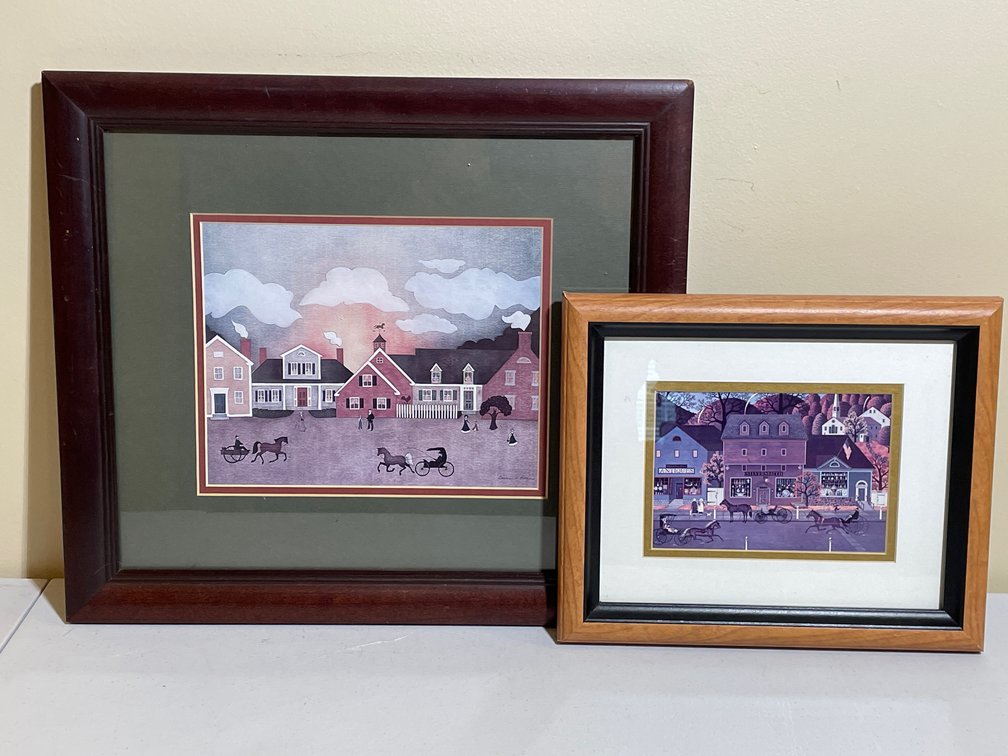 Pair of Framed Folk Art Village Scene Prints, one Signed by Barbara A. Pitman