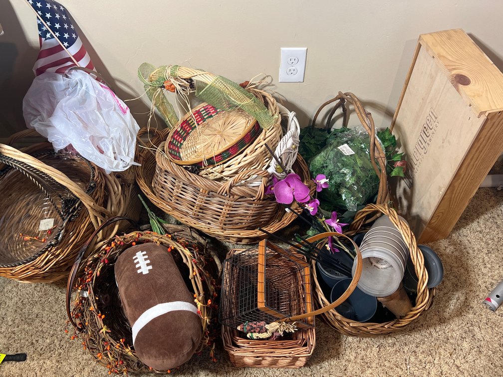 Assortment of Woven Storage Baskets, Wooden Crate, and Decorative Accents