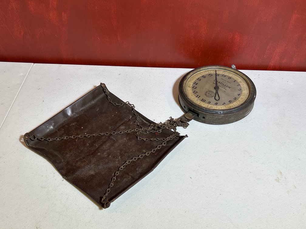 Antique John Chatillon & Sons hanging scale with a scoop pan.