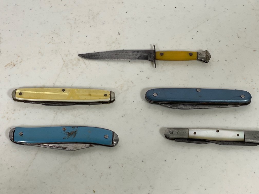 4 Pocket Knives and 1 Straight Blade Knife