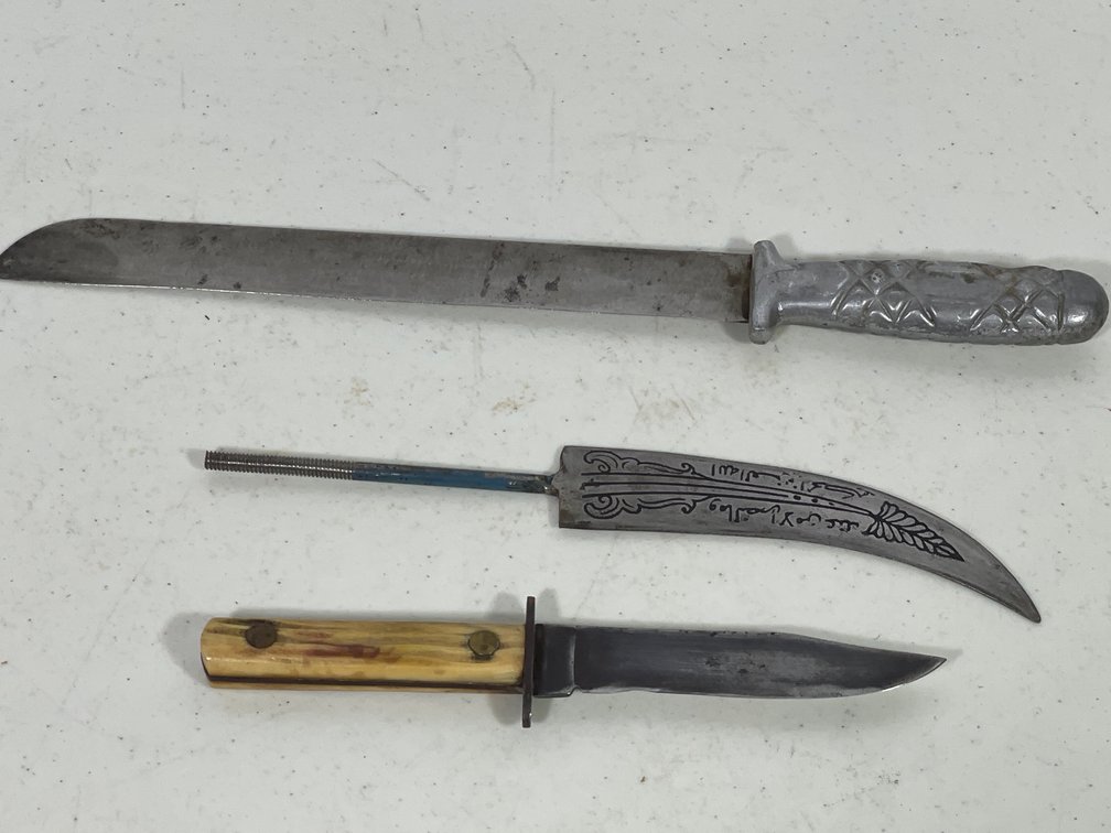 2 Knives, One Curved Decorated Blade with Tang