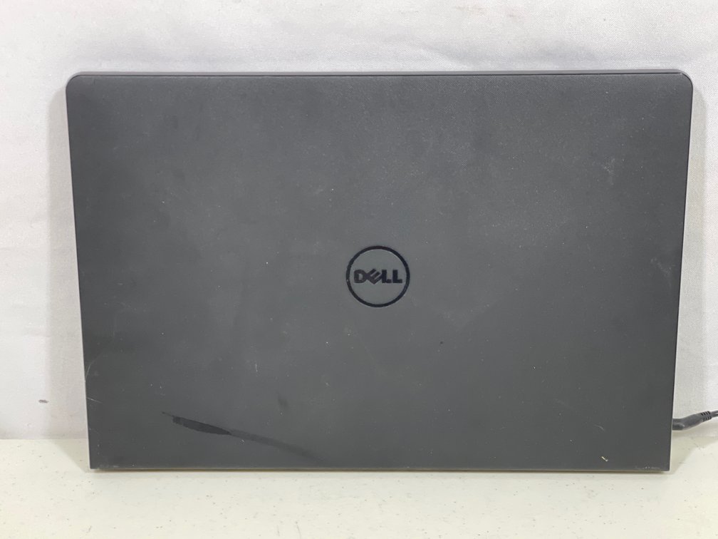 Dell Laptop with Built-In Number Pad and Power Cord