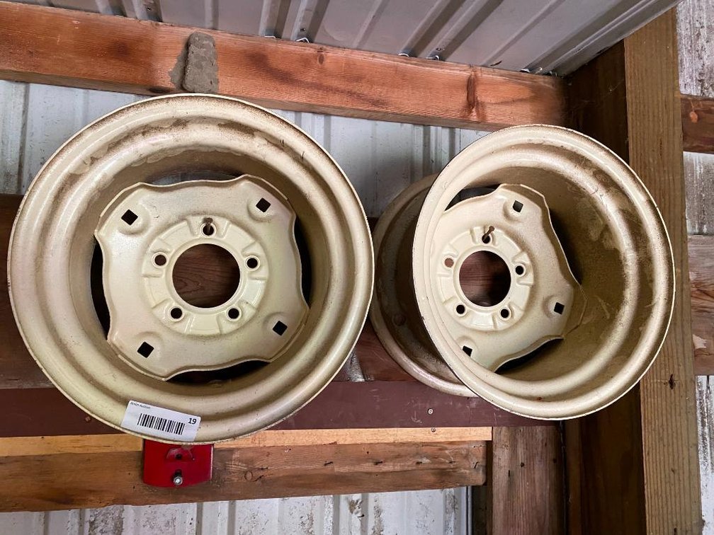 two lawn mower rims