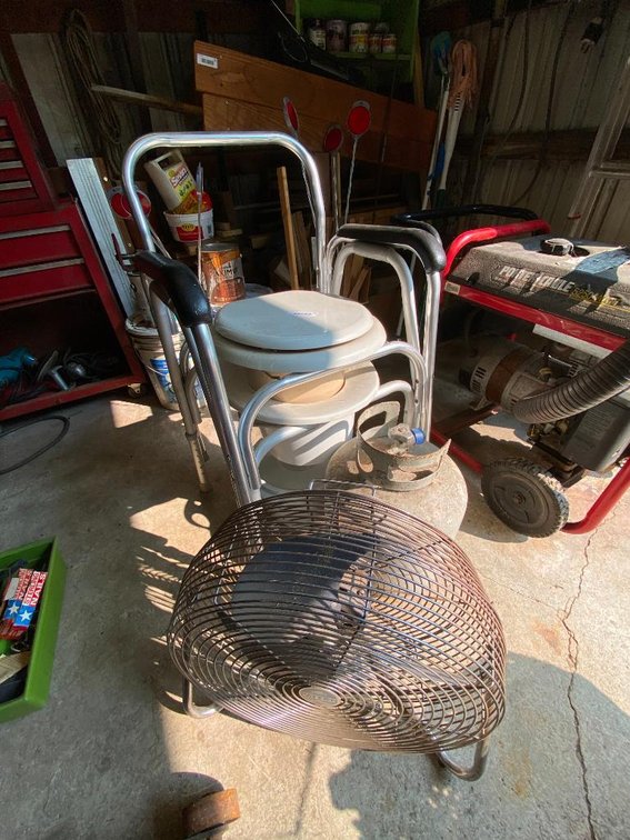 Handicap chairs, propane tank and fan