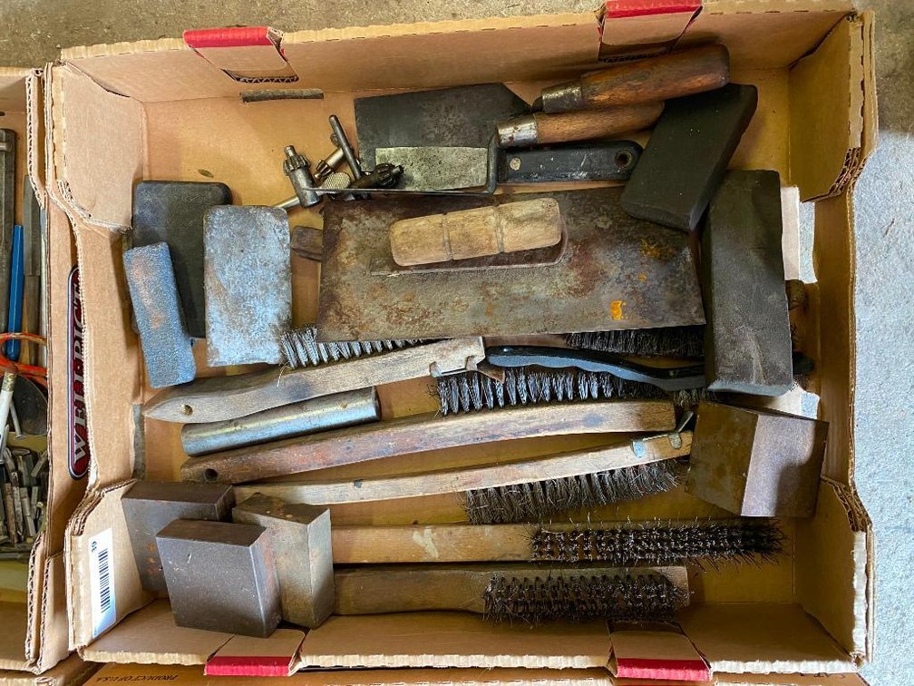 box of brushes, masonry tools and blocks