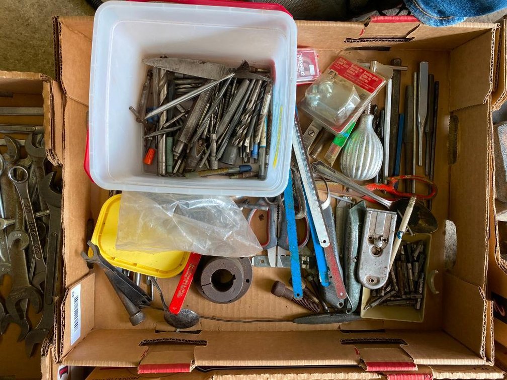 Box of tools, clamps, utility knives