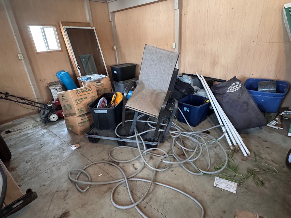 Contents of corner (mower not included)