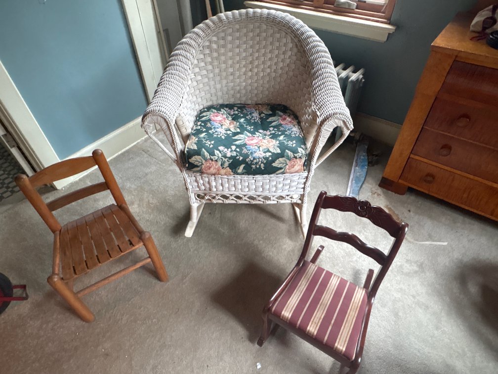 Wicker Rocking Chair and Two Child-Sized Wooden Chairs
