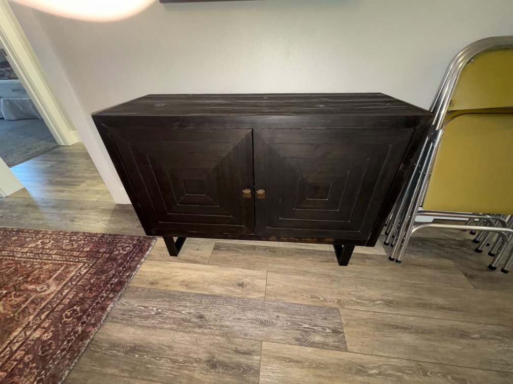 Dark Finish Two-Door Cabinet with Geometric Relief Panels