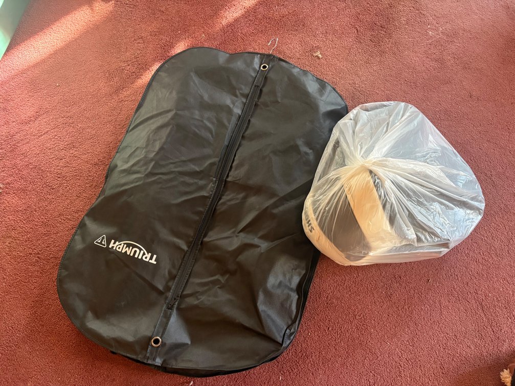 Triumph Leather Jacket and Motorcycle Helmets