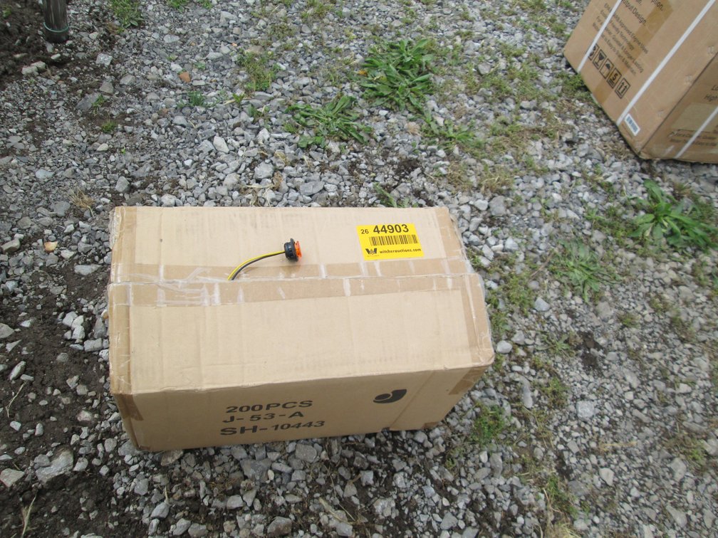 Unused Case of Amber Button Lights INV# 44903