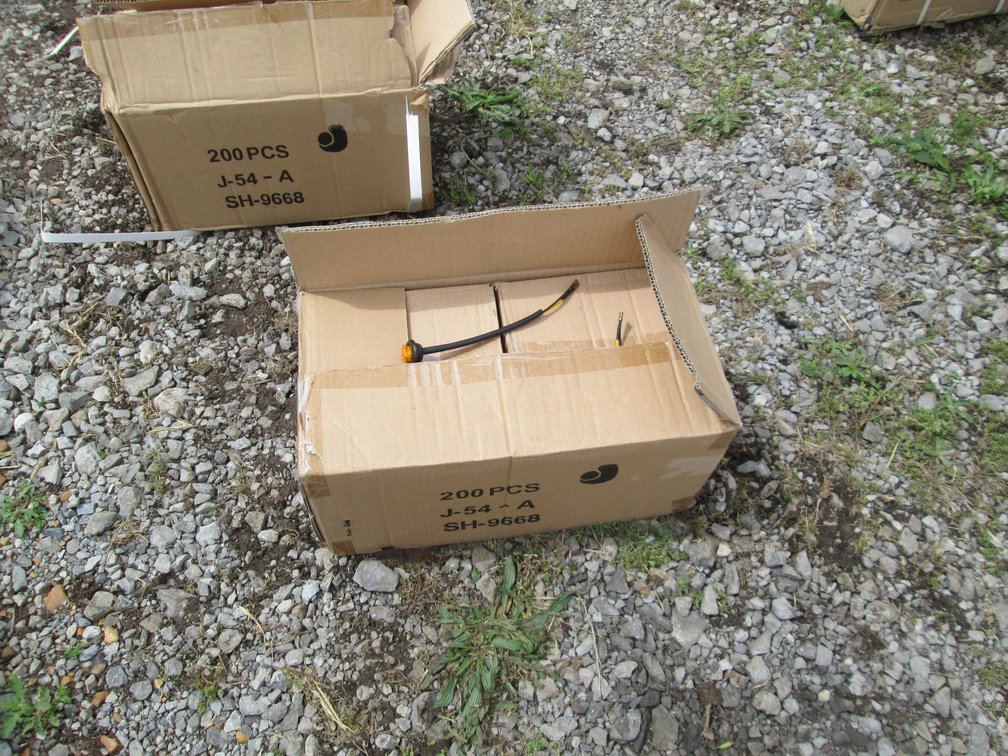 Unused Case of Amber Button Lights INV# 44901