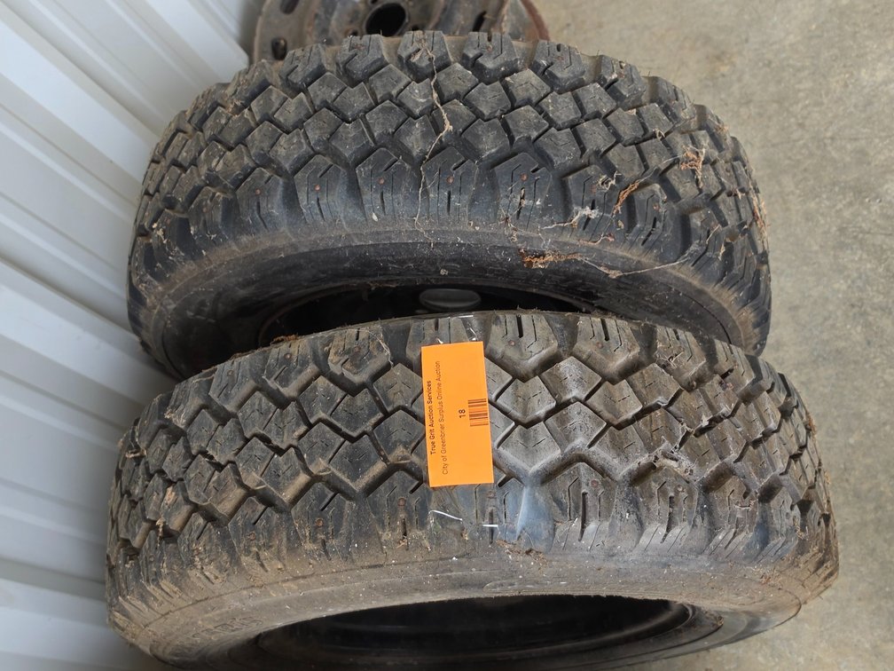 (2) P215/75R15 Studded Tires