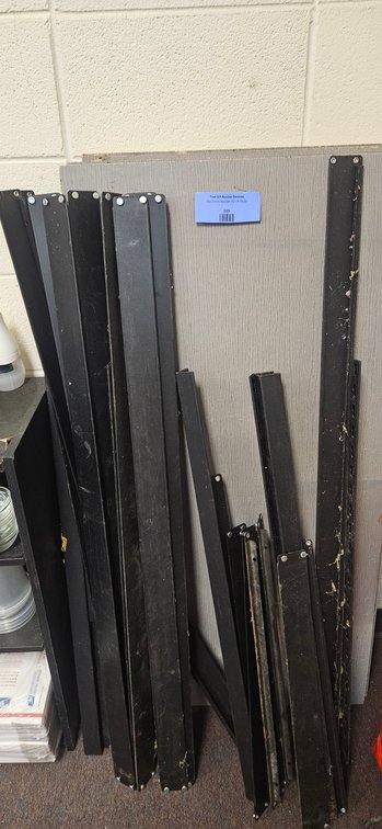 Black Metal Shelving Uprights and Gray Panels