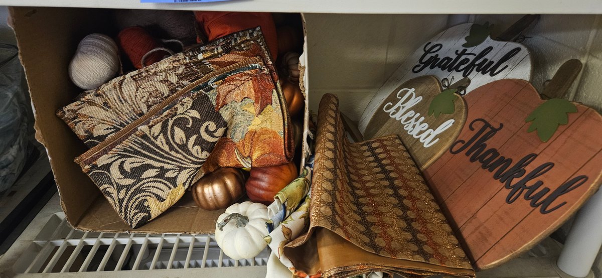 Autumn Decor with Pumpkins, Wooden Plaques, and Textiles