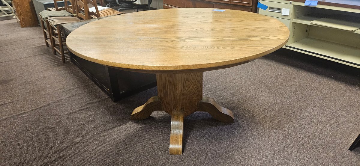 Round Oak Pedestal Table with Four Curved Feet