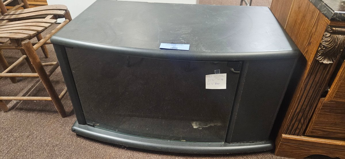 Black Curved-Front Media Stand with Tinted Glass Door