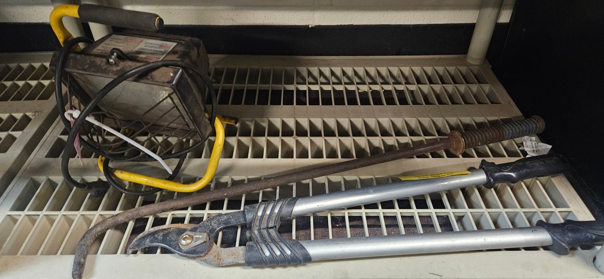 Portable Work Light, Bypass Loppers, and Steel Rod Tool
