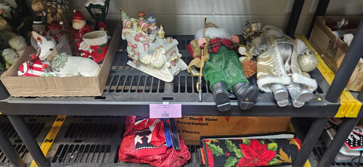 Holiday Decor Collection with Santa Figurines and Sleigh
