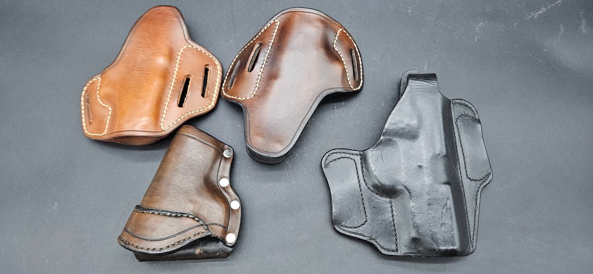 Four Molded Leather Firearm Holsters