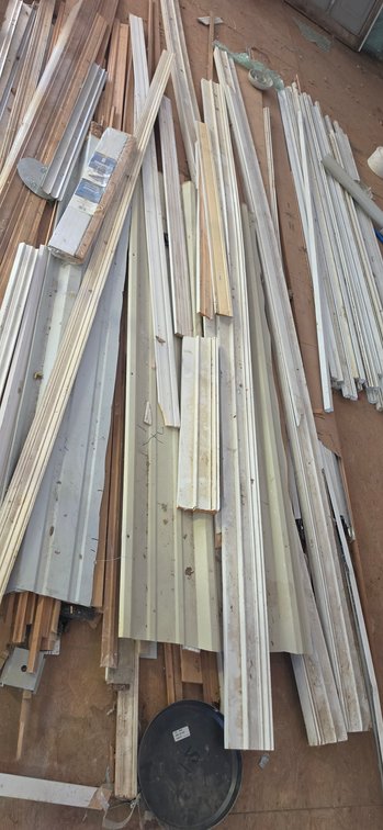 Assorted Trim Moulding, Wood Boards, and Corrugated Metal Panels