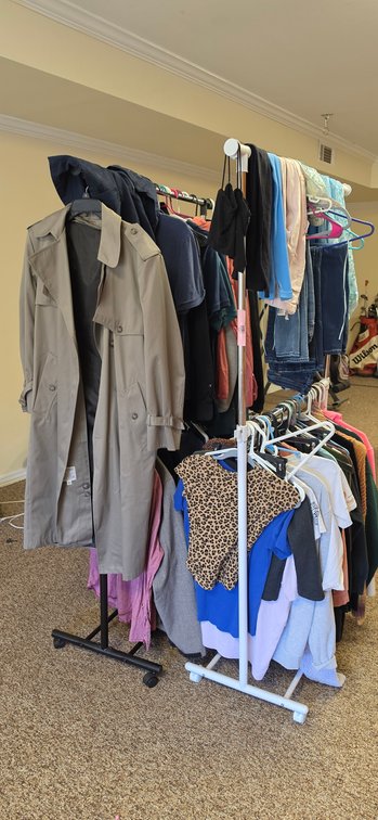 Rolling Garment Racks with Jackets, Shirts, Jeans, and More