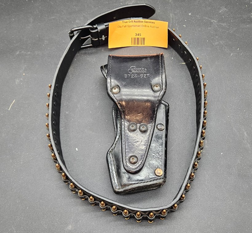 Leather Handgun Holster, Cartridge Belt, and Ammunition