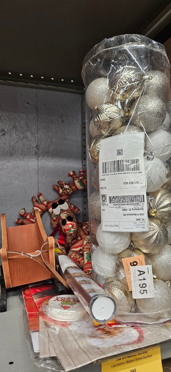 Tabletop Wooden Sleigh, Plush Reindeer, and Christmas Ornaments