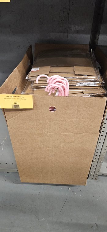 Flat-Packed Cardboard Boxes and Pink Plastic Hangers