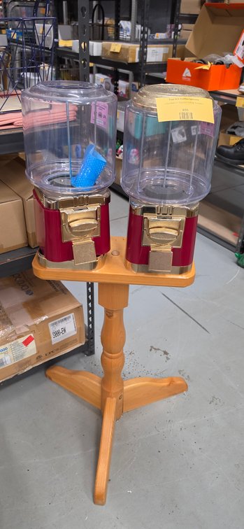 Two Bulk Candy Vending Machines on Wooden Stand