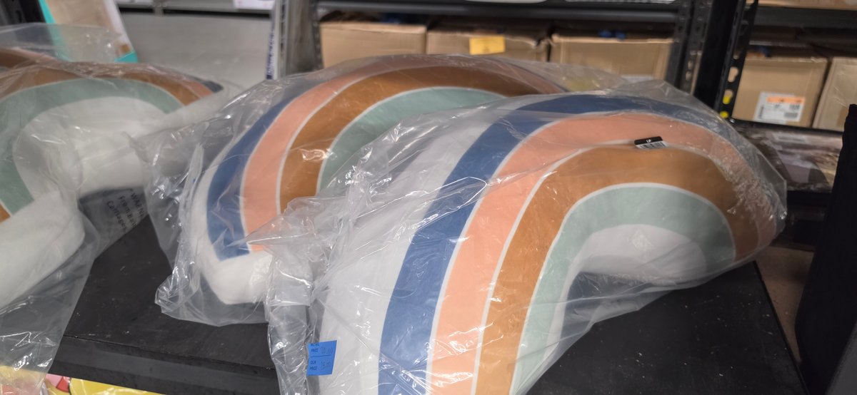 2 Rainbow-Striped Plush Pillows