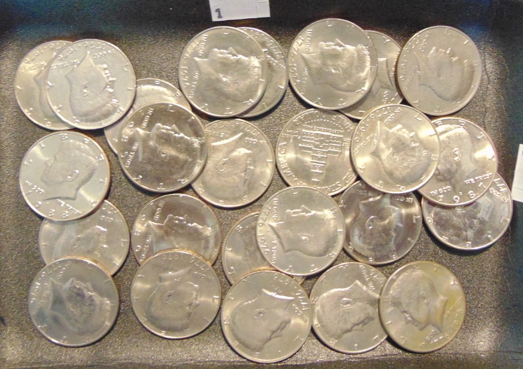 25 Kennedy Half Dollars (clad, some UNC).