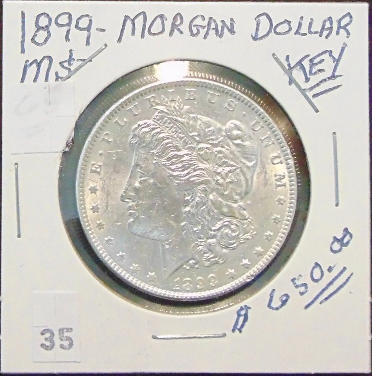 1899 Morgan Dollar (key date, low mintage).