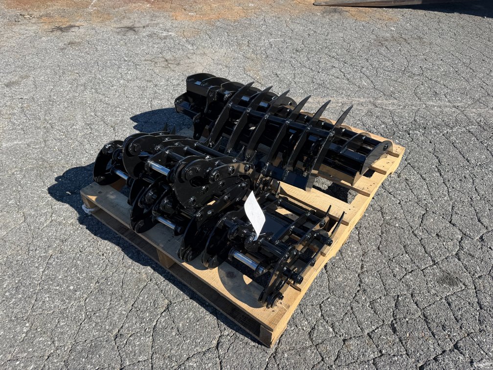 Skid Lot Of New Mini Excavator Attachments