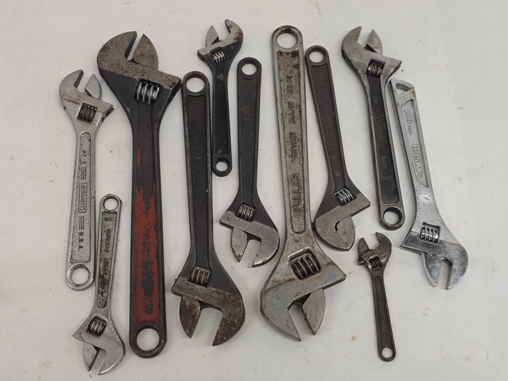 (11) Assorted Adjustable Wrenches