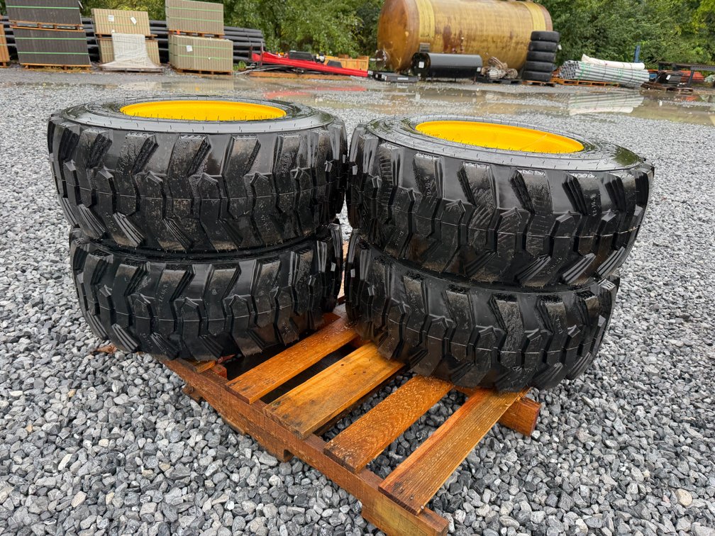 New Set Of (4) 12-16.5 NHS Skid Loader Tires W/Rim